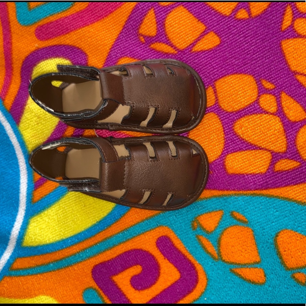 Another pair of brown sandals
